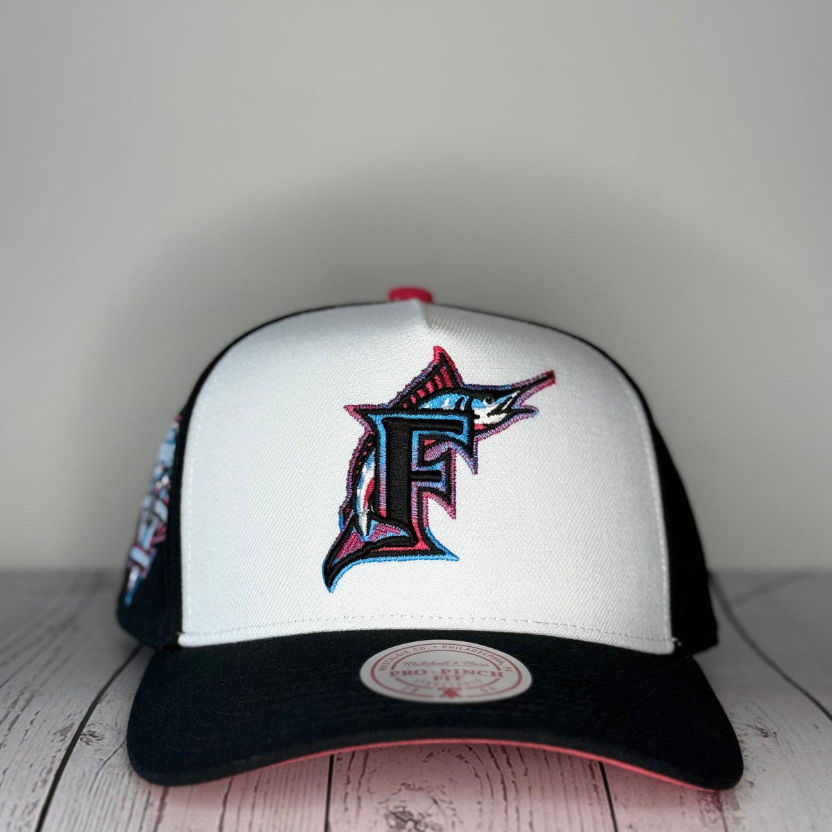Mitchell & Ness Florida Marlins Era Flip Heritage Series Pro Pinch Snapback Hat – White/Black