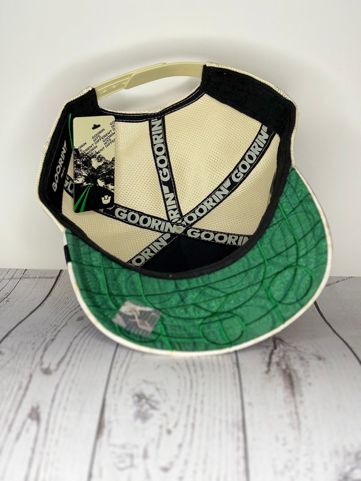 Goorin Bros Holy Cow trucker hat interior with green undervisor